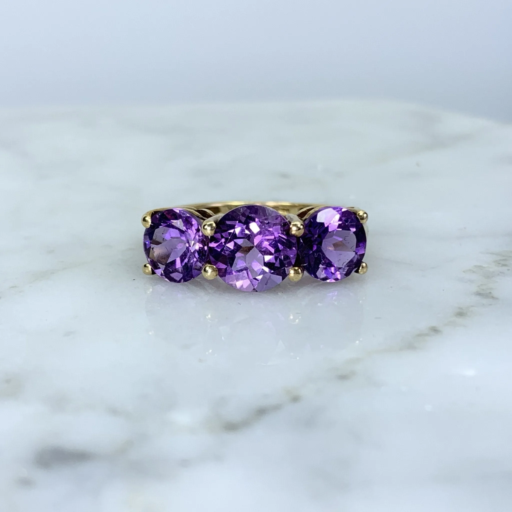 1970s Amethyst Ring with Three Bright Purple Gemstones set in Yellow Gold. February Birthstone.