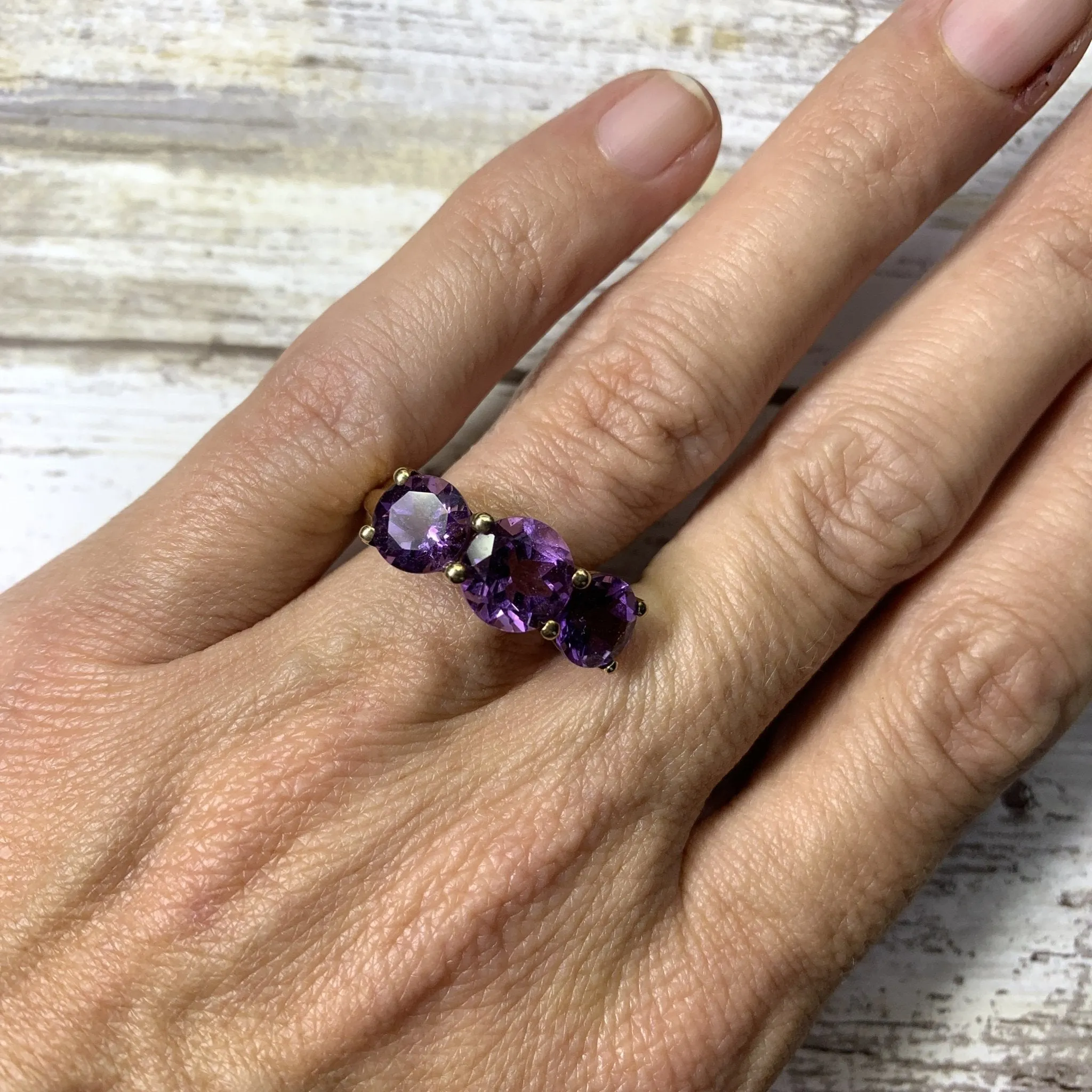 1970s Amethyst Ring with Three Bright Purple Gemstones set in Yellow Gold. February Birthstone.