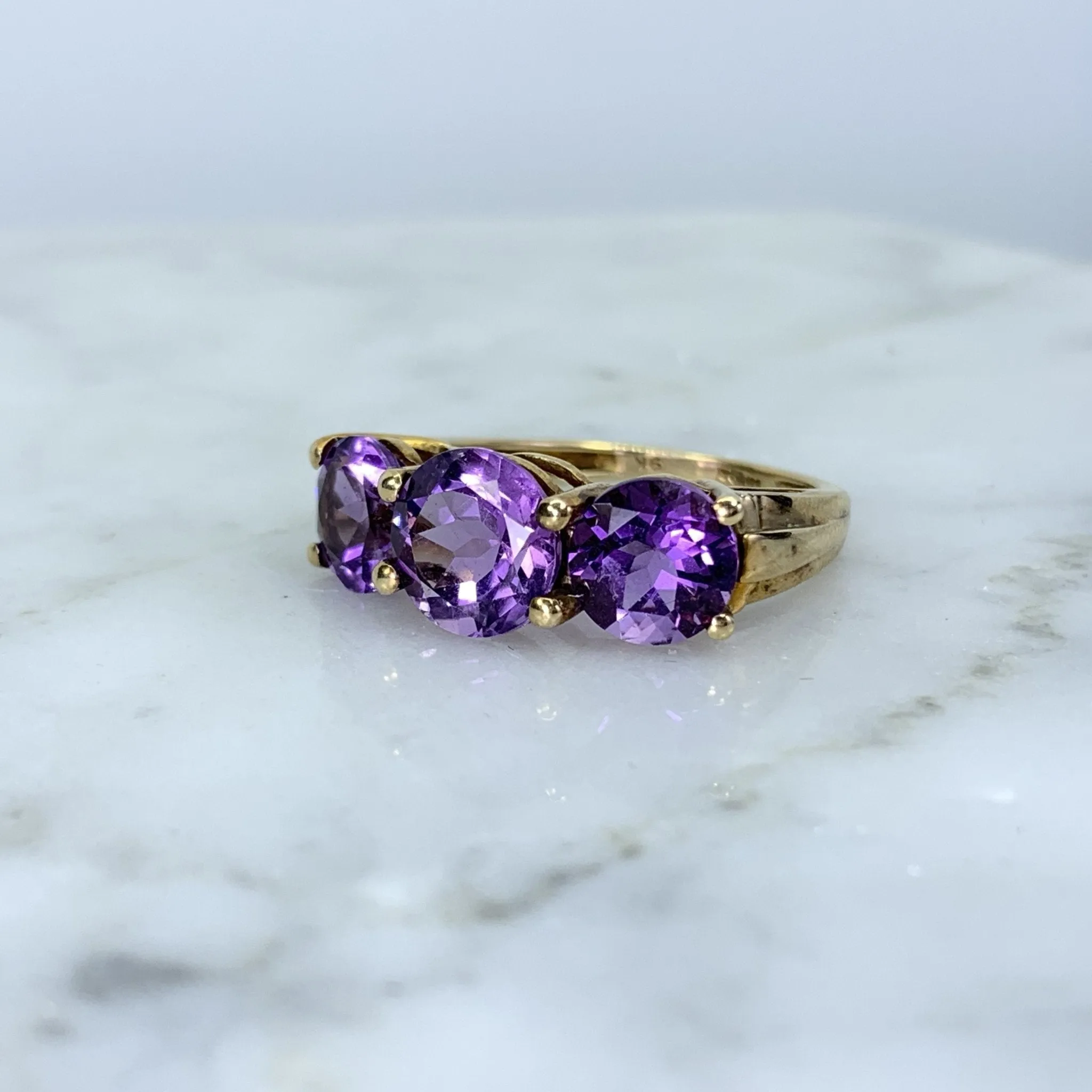 1970s Amethyst Ring with Three Bright Purple Gemstones set in Yellow Gold. February Birthstone.