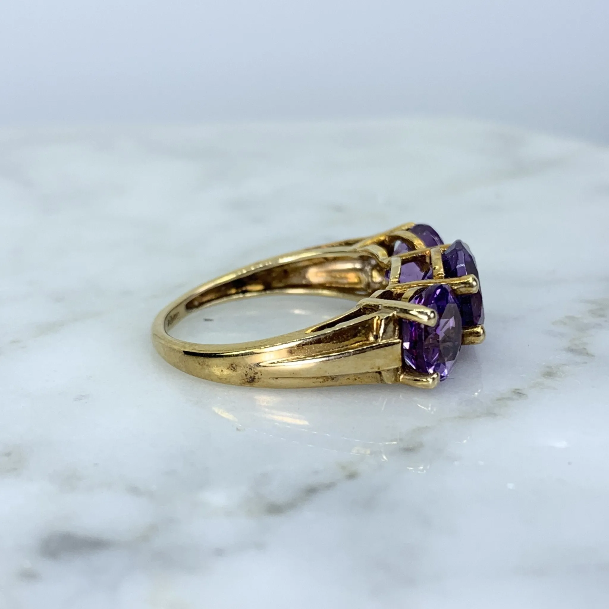 1970s Amethyst Ring with Three Bright Purple Gemstones set in Yellow Gold. February Birthstone.