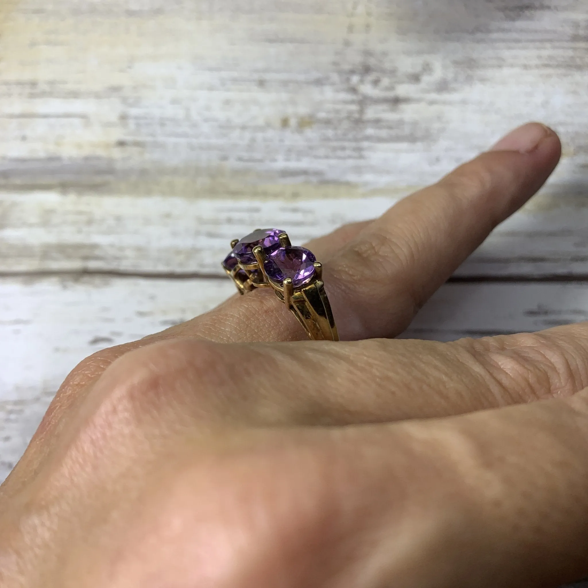 1970s Amethyst Ring with Three Bright Purple Gemstones set in Yellow Gold. February Birthstone.