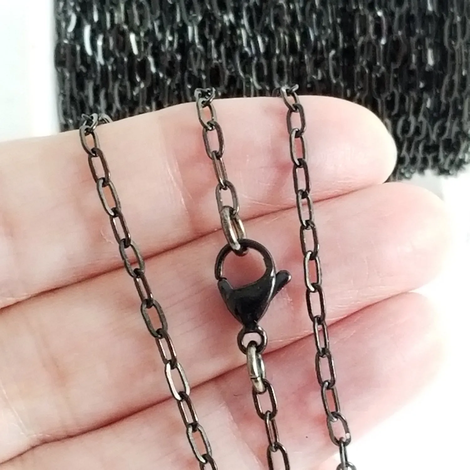 Black Cross Chain, Stainless Steel, 4.5x2.5mm, Soldered Closed Links, Lot Size 25 Meters (approx 75 feet) Spooled, #1926 BL